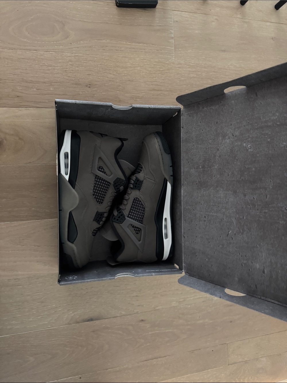 Jordan Retro 4 Sneakers in Grey/Black/White